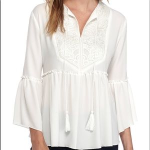 New directions  off white blouse